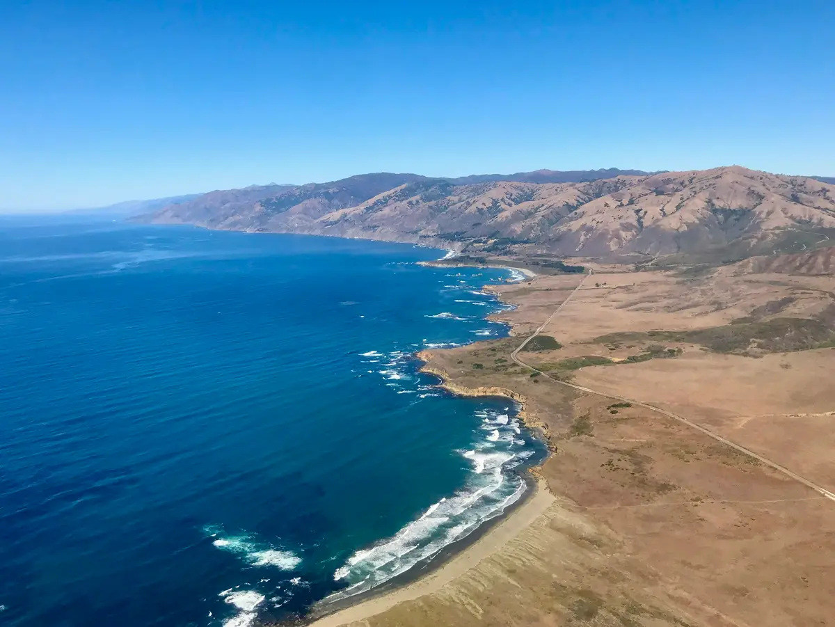 Luxury resort coastline behind the Roave Agents pricing section